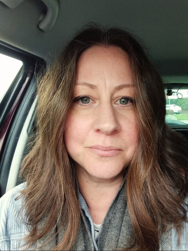 Lucy Godfrey, Second Hand Dance Senior Producer Lucy Godfrey, Second Hand Dance Senior Producer with shoulder-length brown hair, wearing a grey scarf and light jacket,